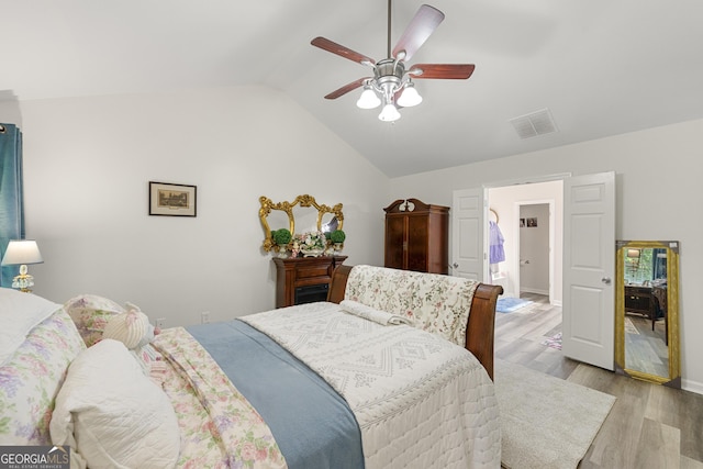 58 Lilyfield Ln, Acworth, GA 30101 - bedroom with lofted ceiling, light wood-style floors, and a ceiling fan