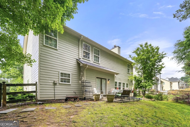58 Lilyfield Ln, Acworth, GA 30101 - rear view of house with a chimney and a patio area