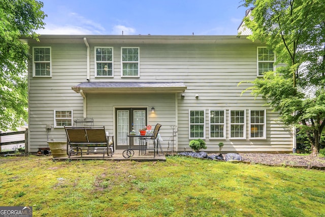 58 Lilyfield Ln, Acworth, GA 30101 - back of house featuring a lawn and a patio