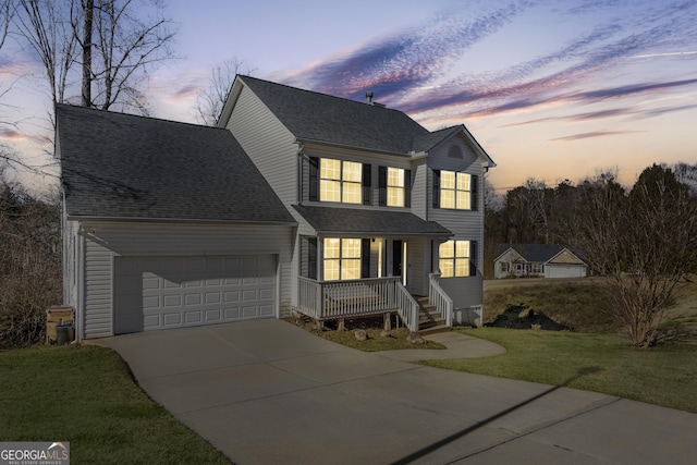 8810 Brookhurst Trl, Gainesville, GA 30506 - traditional home with covered porch, an attached garage, driveway, a front yard, and a shingled roof