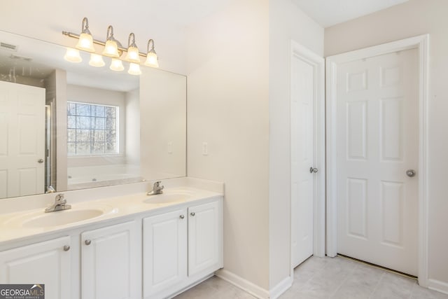 8810 Brookhurst Trl, Gainesville, GA 30506 - bathroom with double vanity, a garden tub, a shower stall, and tile patterned flooring
