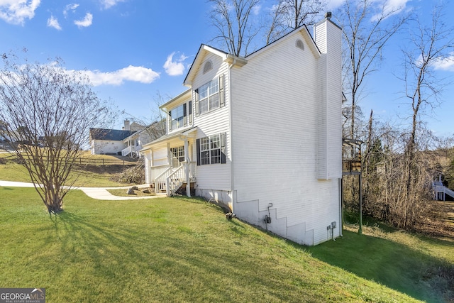 8810 Brookhurst Trl, Gainesville, GA 30506 - view of side of property with a chimney and a yard