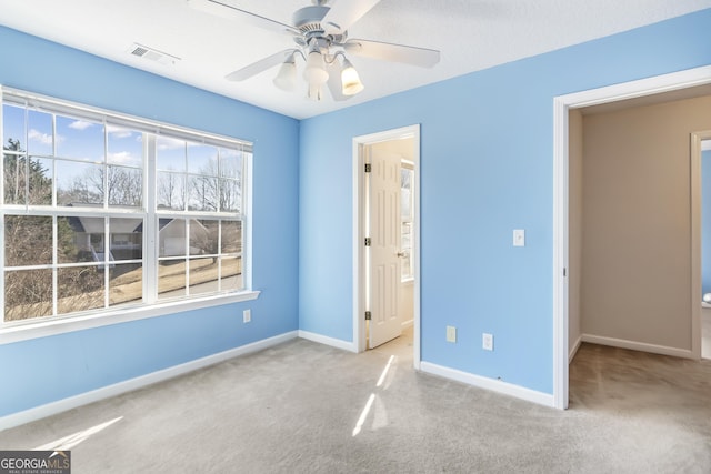 8810 Brookhurst Trl, Gainesville, GA 30506 - unfurnished bedroom with carpet floors, a ceiling fan, and connected bathroom
