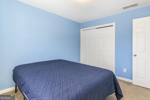 8810 Brookhurst Trl, Gainesville, GA 30506 - bedroom with light colored carpet and a closet