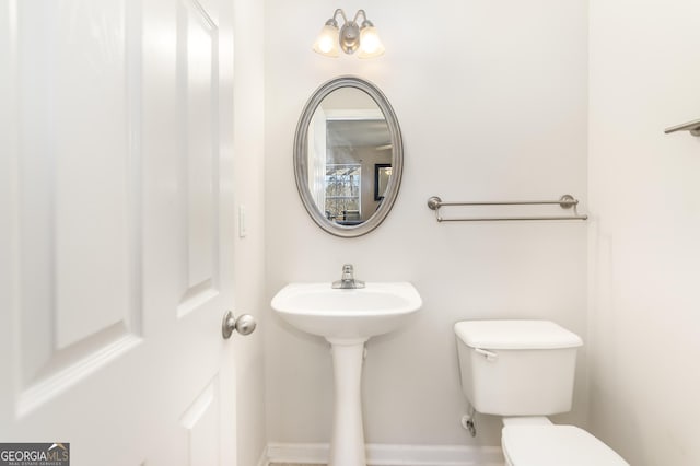 8810 Brookhurst Trl, Gainesville, GA 30506 - half bathroom with toilet and baseboards