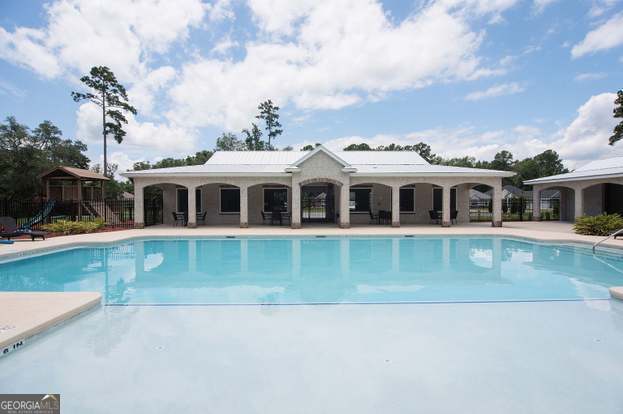 204 Camden Woods Pkwy, Kingsland, GA 31548 - community pool featuring a patio area and a gazebo