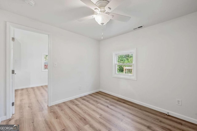 5153 Westbrook Pl, Union City, GA 30291 - spare room with light wood-type flooring, ceiling fan, and a smoke detector