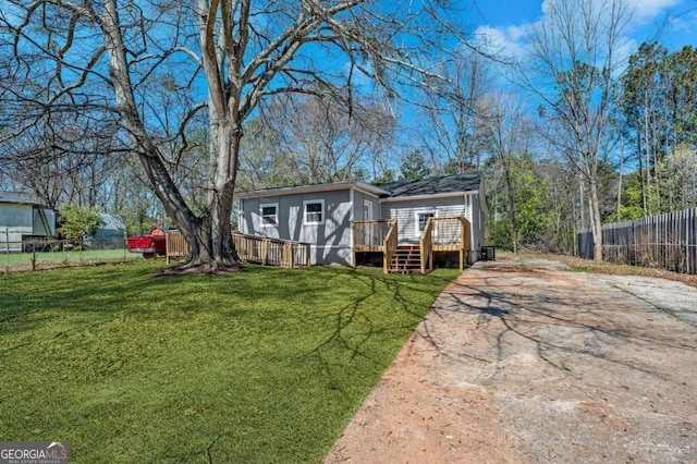 5153 Westbrook Pl, Union City, GA 30291 - view of front of home with a wooden deck and driveway