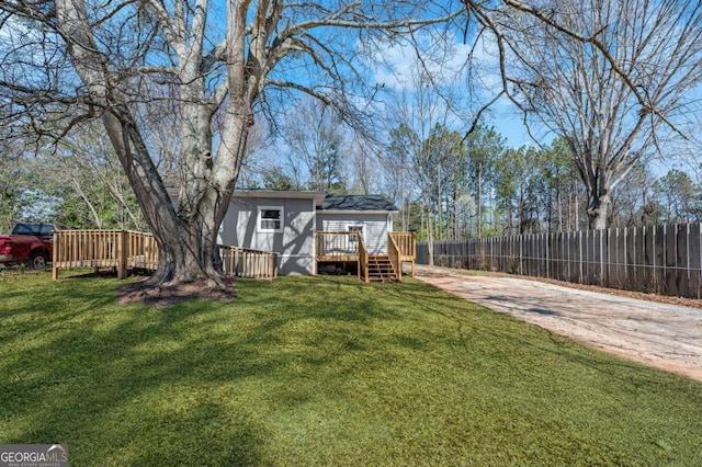 5153 Westbrook Pl, Union City, GA 30291 - view of yard featuring a wooden deck and concrete driveway