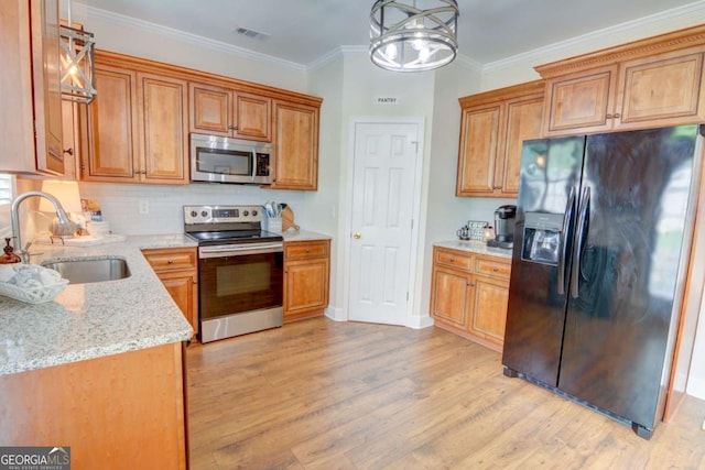 2557 Avery Park Cir, Atlanta, GA 30360 - kitchen featuring appliances with stainless steel finishes, light wood-type flooring, light stone countertops, tasteful backsplash, and ornamental molding