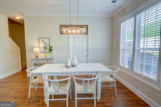 2557 Avery Park Cir, Atlanta, GA 30360 - dining area featuring ornamental molding and wood finished floors