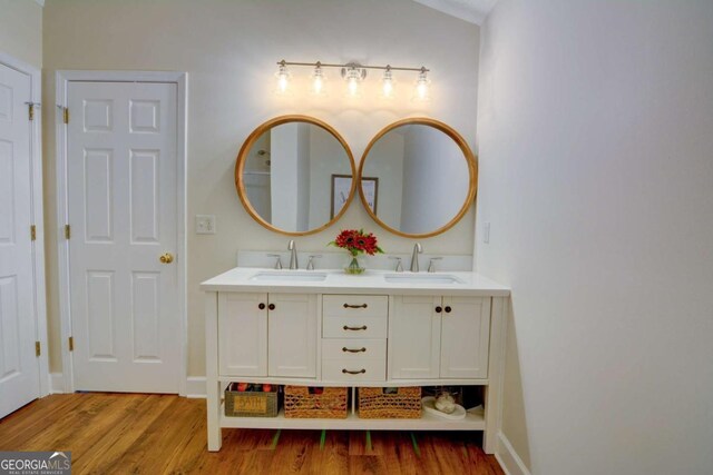 2557 Avery Park Cir, Atlanta, GA 30360 - full bath with double vanity and wood finished floors