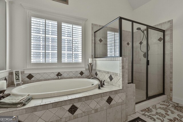 118 Fire Creek Trl, Senoia, GA 30276 - full bath with a garden tub, a stall shower, and plenty of natural light