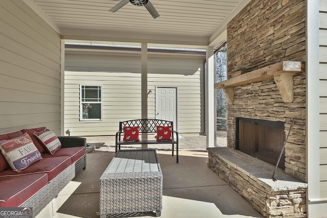 118 Fire Creek Trl, Senoia, GA 30276 - view of patio / terrace featuring ceiling fan and an outdoor living space with a fireplace