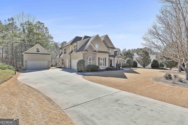 118 Fire Creek Trl, Senoia, GA 30276 - view of front of property featuring stone siding, driveway, and an outdoor structure
