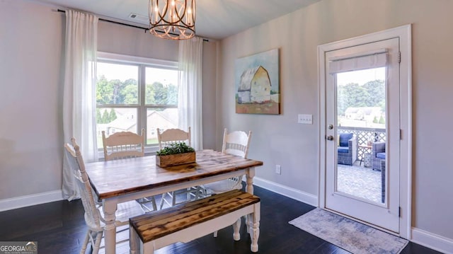 8325 Post Oak Ln, Gainesville, GA 30506 - dining space featuring a chandelier, healthy amount of natural light, and dark wood-style floors