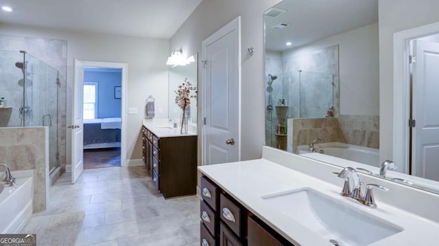 8325 Post Oak Ln, Gainesville, GA 30506 - bathroom featuring vanity, a garden tub, a shower stall, recessed lighting, and tile patterned floors