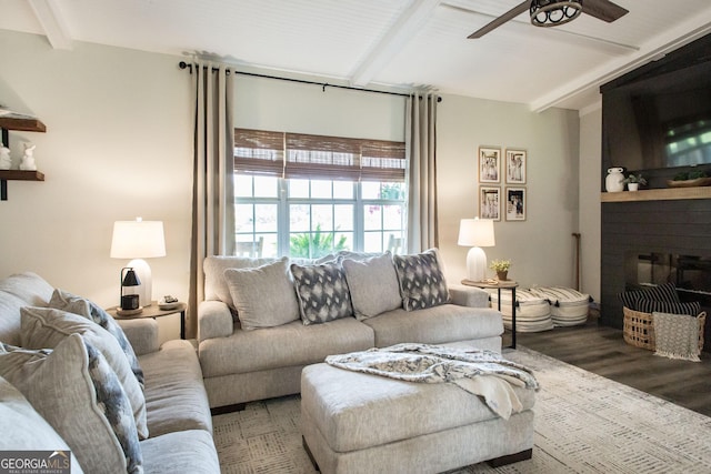 313 White Pine Highway, Nicholls, GA 31554 - living area featuring beam ceiling, a large fireplace, ceiling fan, and wood finished floors
