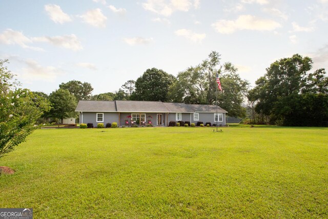 313 White Pine Highway, Nicholls, GA 31554 - view of front of house featuring a front yard and view of scattered trees