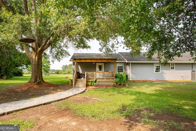 313 White Pine Highway, Nicholls, GA 31554 - rear view of property featuring a yard and a deck