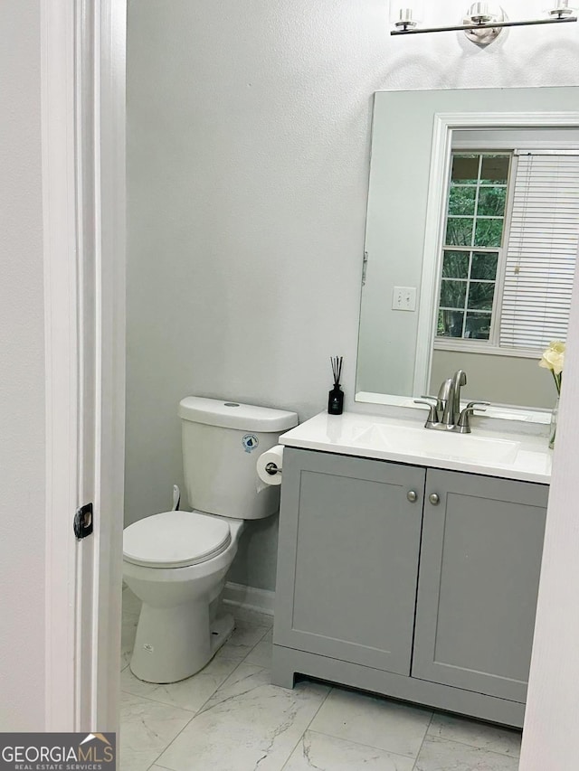 6834 White Walnut Way, Braselton, GA 30517 - bathroom featuring marble look tile flooring and vanity