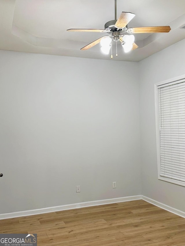 6834 White Walnut Way, Braselton, GA 30517 - empty room with light wood-style floors and a ceiling fan