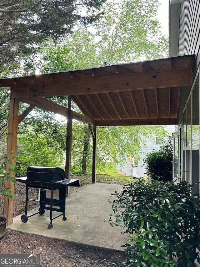6834 White Walnut Way, Braselton, GA 30517 - view of patio with a grill