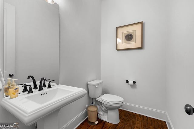 150 Dean Dr, Tyrone, GA 30290 - bathroom featuring baseboards and wood finished floors