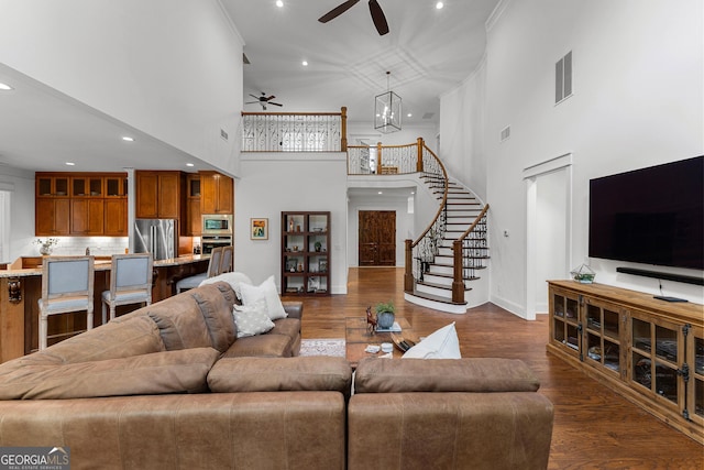 150 Dean Dr, Tyrone, GA 30290 - living room with a ceiling fan, a towering ceiling, stairway, recessed lighting, and dark wood-style floors