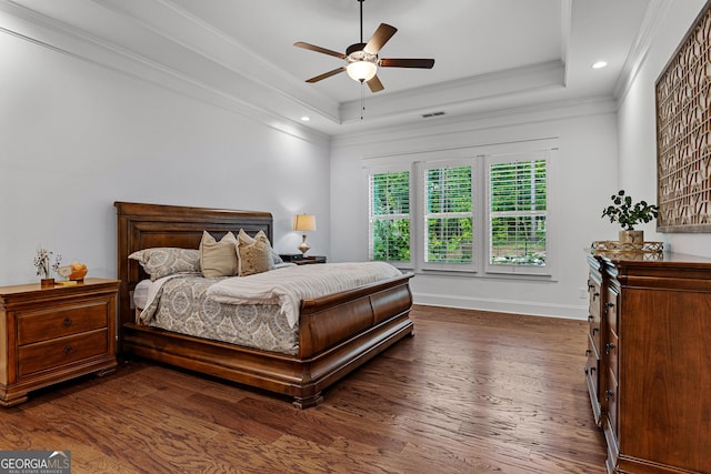 150 Dean Dr, Tyrone, GA 30290 - bedroom featuring dark wood finished floors, a tray ceiling, ornamental molding, recessed lighting, and a ceiling fan