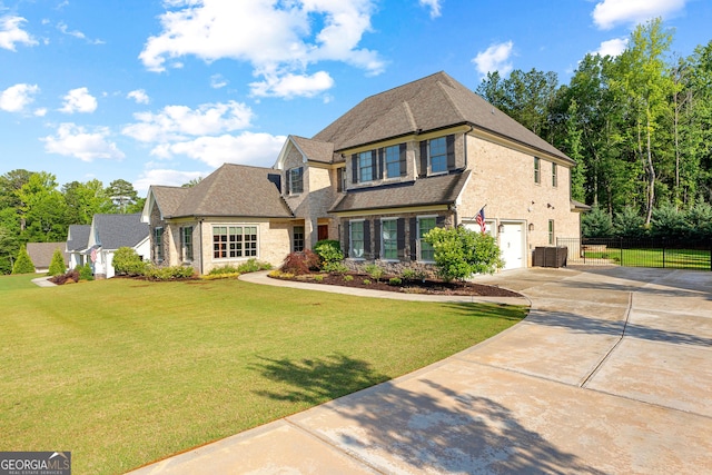 150 Dean Dr, Tyrone, GA 30290 - view of front of house with an attached garage, driveway, and a shingled roof