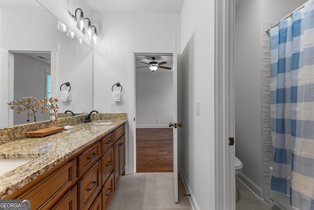 150 Dean Dr, Tyrone, GA 30290 - full bath featuring double vanity, ceiling fan, tile patterned floors, and curtained shower