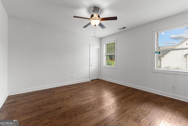 150 Dean Dr, Tyrone, GA 30290 - empty room featuring dark wood-style flooring and a ceiling fan