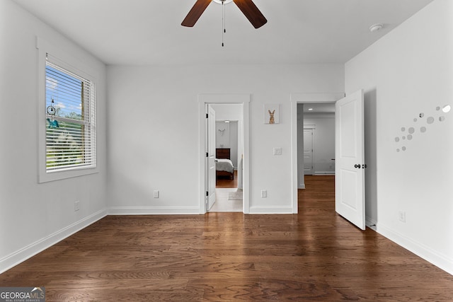 150 Dean Dr, Tyrone, GA 30290 - unfurnished bedroom with wood finished floors and a ceiling fan