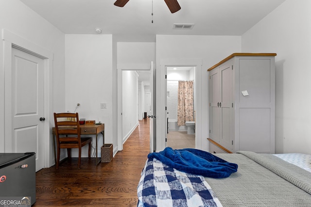 150 Dean Dr, Tyrone, GA 30290 - bedroom featuring wood finished floors, ensuite bathroom, a ceiling fan, and freestanding refrigerator