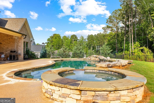150 Dean Dr, Tyrone, GA 30290 - view of pool with a fenced backyard, grilling area, a patio, and a pool with connected hot tub