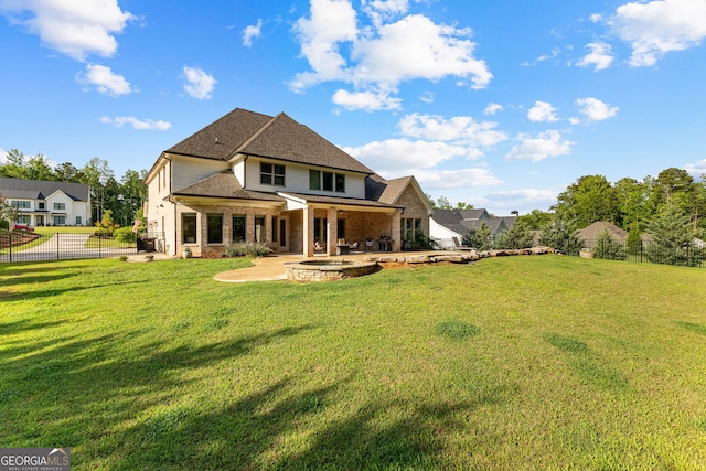 150 Dean Dr, Tyrone, GA 30290 - back of property featuring a patio, brick siding, and a shingled roof