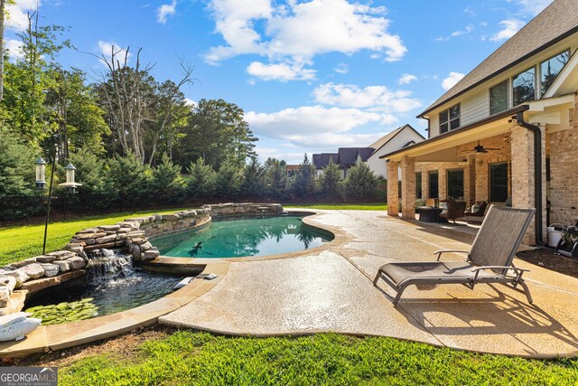 150 Dean Dr, Tyrone, GA 30290 - view of swimming pool with a ceiling fan, a patio area, a pool with connected hot tub, and an outdoor hangout area
