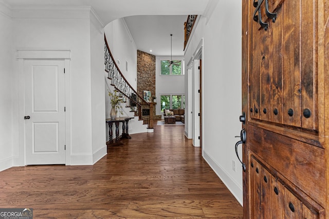 150 Dean Dr, Tyrone, GA 30290 - foyer featuring stairs, wood finished floors, crown molding, a high ceiling, and recessed lighting