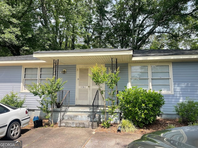 531 Locke Street Units A & B, Palmetto, GA 30268 - doorway to property featuring covered porch and roof with shingles
