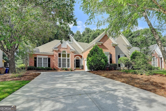 1635 Lake Heights Cir, Dacula, GA 30019 - view of front of home with brick siding and concrete driveway