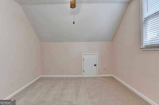 1635 Lake Heights Cir, Dacula, GA 30019 - additional living space with vaulted ceiling and light carpet