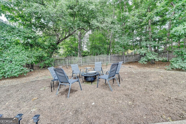 1635 Lake Heights Cir, Dacula, GA 30019 - fenced backyard featuring a fire pit