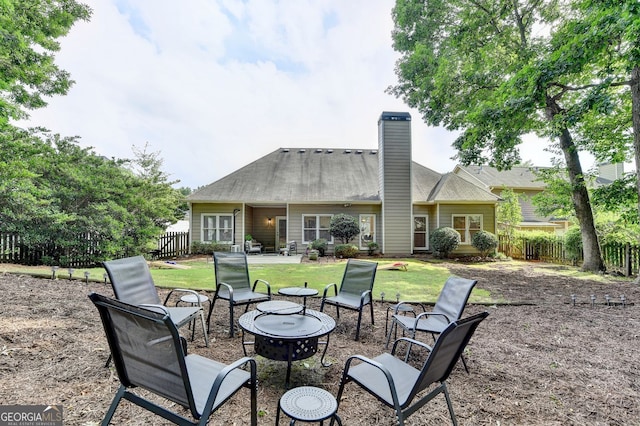 1635 Lake Heights Cir, Dacula, GA 30019 - view of patio featuring a fire pit