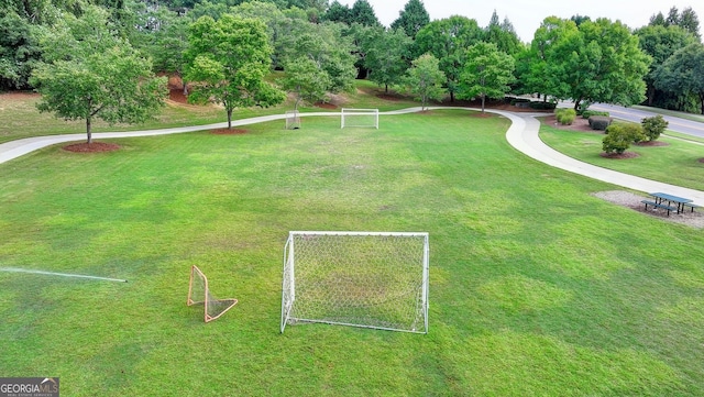1635 Lake Heights Cir, Dacula, GA 30019 - view of property's community with a sport area and view of wooded area