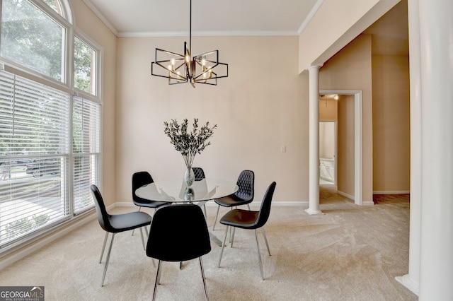 1635 Lake Heights Cir, Dacula, GA 30019 - dining area featuring ornate columns, carpet, crown molding, and a chandelier