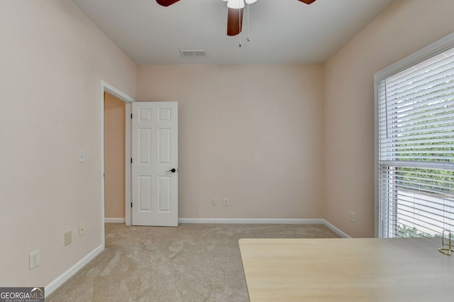 1635 Lake Heights Cir, Dacula, GA 30019 - spare room featuring ceiling fan and carpet flooring