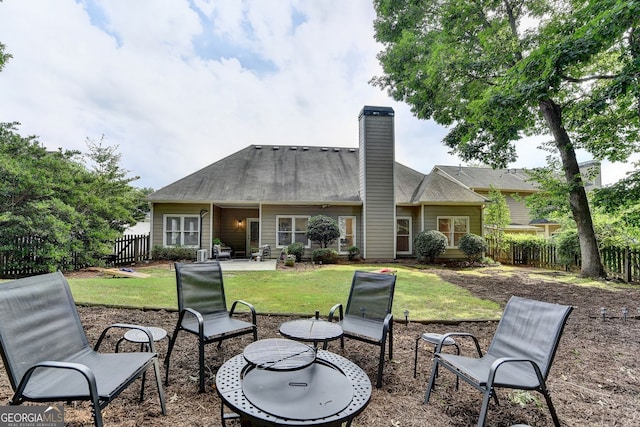 1635 Lake Heights Cir, Dacula, GA 30019 - rear view of property featuring a chimney and a patio