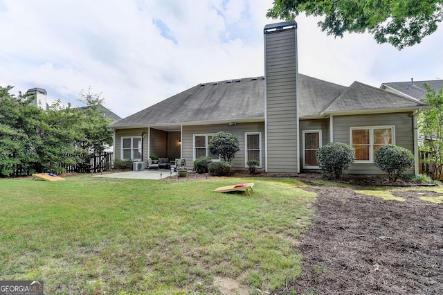 1635 Lake Heights Cir, Dacula, GA 30019 - rear view of house featuring a patio area and a chimney