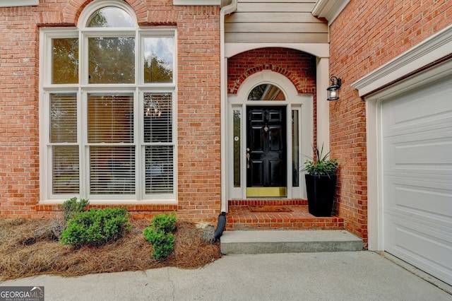 1635 Lake Heights Cir, Dacula, GA 30019 - doorway to property with brick siding and an attached garage
